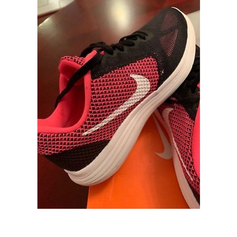 Brand new pink and black nike shoes
